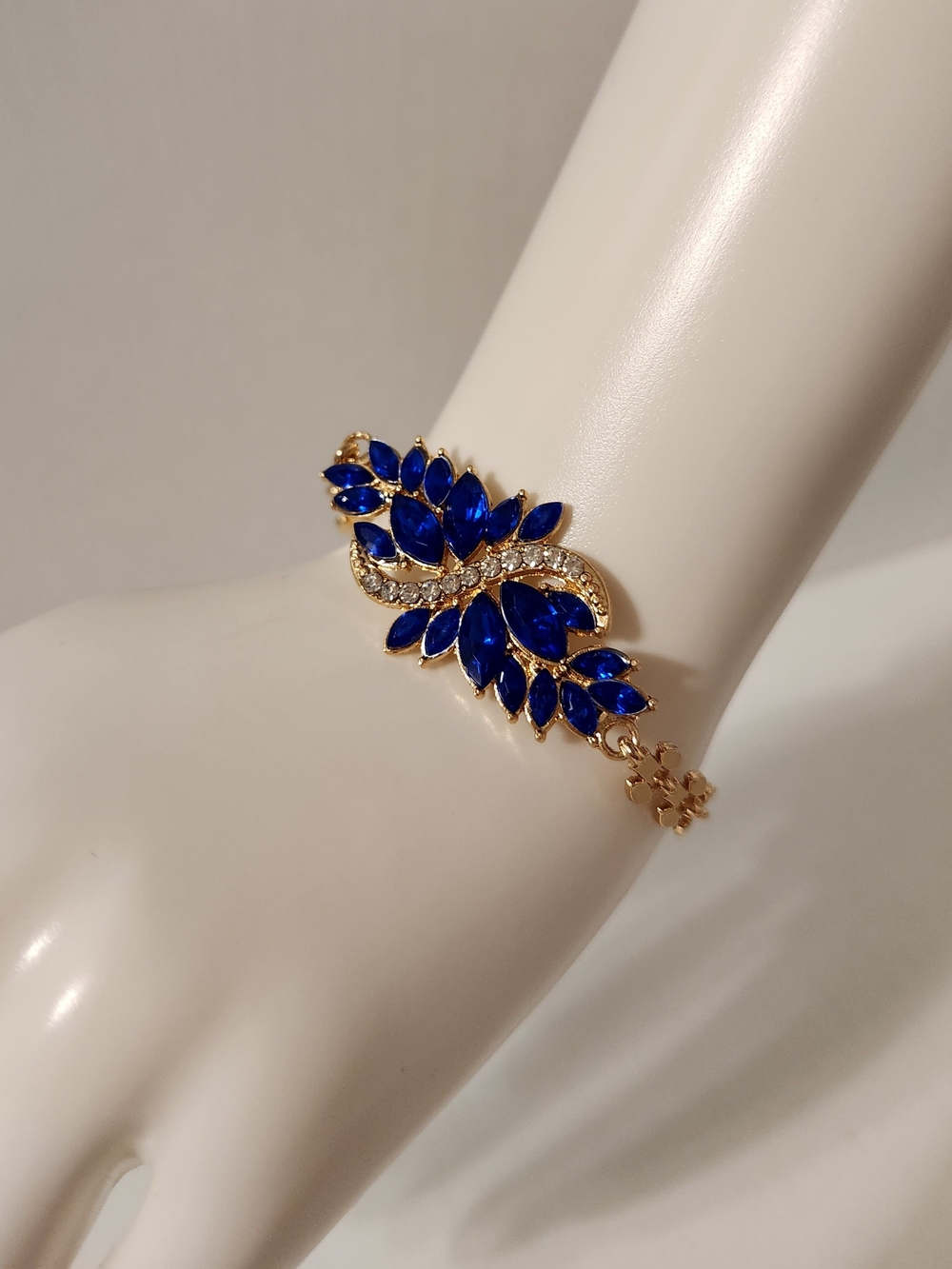 Gold Bracelet with Sapphire Blue Crystal Leaves And Clear Rhinestone Accents